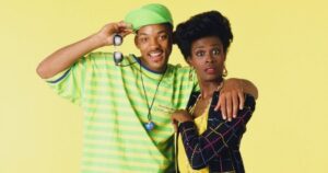 Will Smith and Janet Hubert posing together for a photo