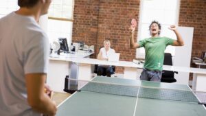 Photo of people playing table tennis